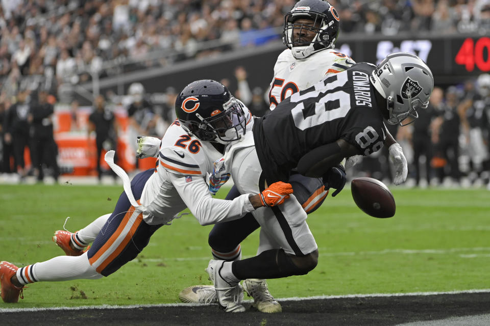 Las Vegas Raiders wide receiver Bryan Edwards (89) misses a catch against Chicago Bears safety Deon Bush (26) during the first half of an NFL football game, Sunday, Oct. 10, 2021, in Las Vegas. (AP Photo/David Becker)