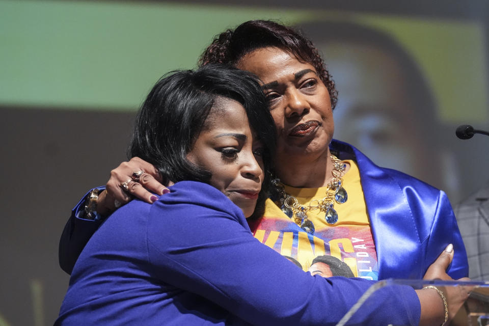 Bernice King daughter of civil-right leader Martin Luther King Jr., right, is embraced by her cousin Angela Farris Watkins as she speaks about her brother Dexter Scott King during a news conference Tuesday, Jan. 23, 2024, in Atlanta. Dexter died Monday, Jan. 22, 2024 at his California home after battling prostate cancer. (AP Photo/John Bazemore)