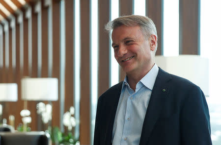 Chief Executive of Russian bank Sberbank German Gref smiles during an interview at his office in Moscow, Russia May 17, 2018. REUTERS/Maxim Shemetov