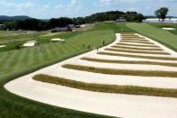 Jun 19, 2016; Oakmont, PA, USA; Bryson DeChambeau plays a shot out of the church pews bunker on the 4th hole during the final round of the U.S. Open golf tournament at Oakmont Country Club. Mandatory Credit: Charles LeClaire-USA TODAY Sports