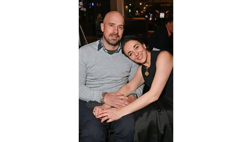 Jonathan and Amanda smiling at press event