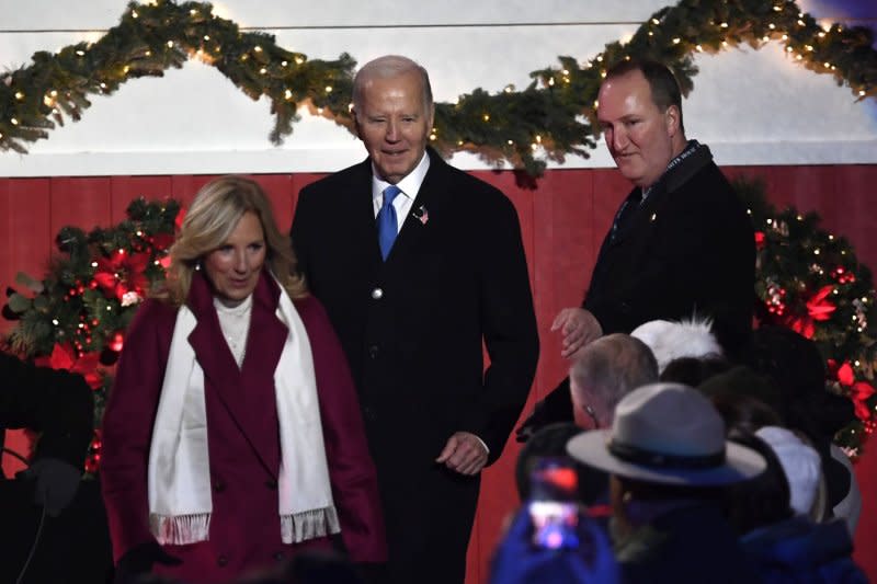 President Joe Biden and First Lady Jill Biden takes their seats among festive Christmas decorations after participating in the lighting of the National Christmas Tree, on the Ellipse, Thursday, November 30, 2023, in Washington, DC. The ceremony dates back to President Calvin Coolidge in 1923 to kick off Holiday celebrations in the Nation's Capital. Photo by Mike Theiler/UPI