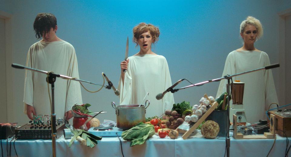 Asa Butterfield (far left), Fatma Mohamed and Ariane Labed star as a collective chosen by an institute to explore avant-garde culinary art in the dark comedy "Flux Gourmet."