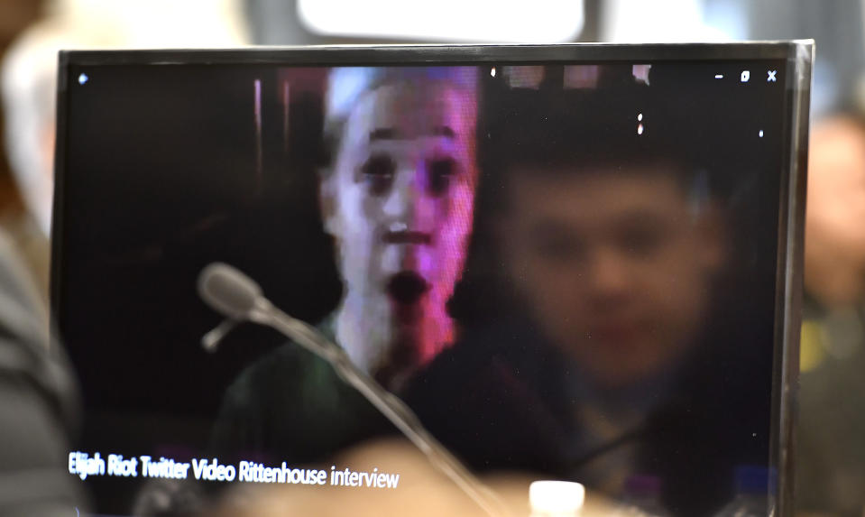 Kyle Rittenhouse is reflected in the monitor as he watches video of himself from the night of Aug. 25, 202, during the trial at the Kenosha County Courthouse in Kenosha, Wis., on Wednesday, Nov. 3 2021. (Sean Krajacic/The Kenosha News via AP, Pool)