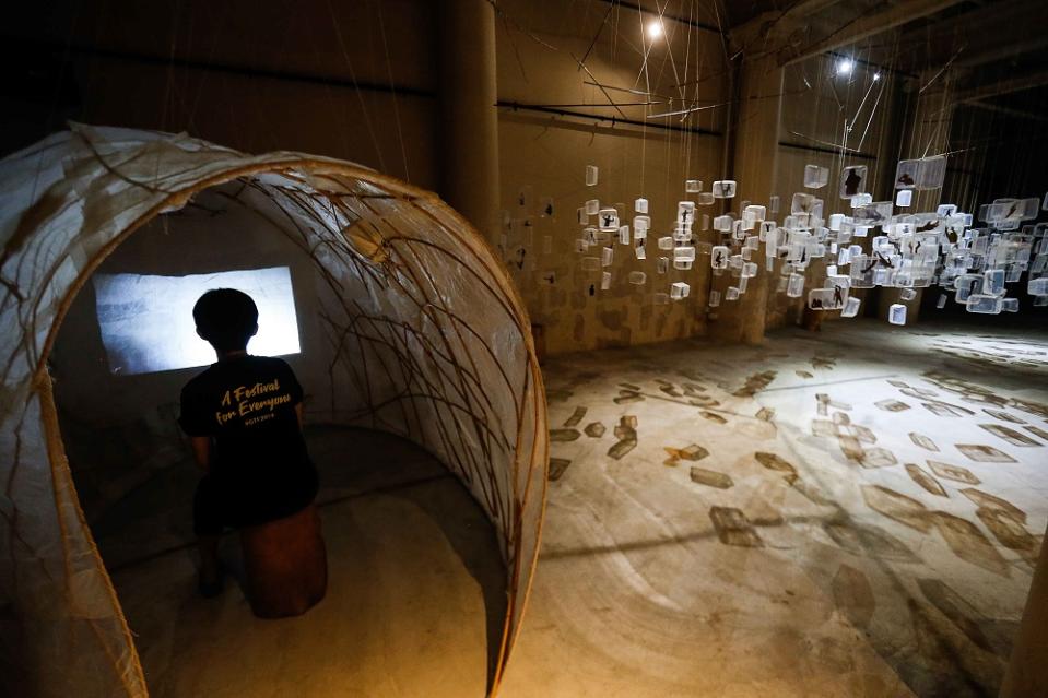 This haunting art installation also features a video dance performance within this white plastic cocoon.