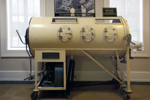 <p>Iron lung (c. 1933) used to breathe for polio patients until 1955 when polio vaccine became available is located in the Mobile Medical Museum, Mobile, Alabama (</p> Stock image of an iron lung