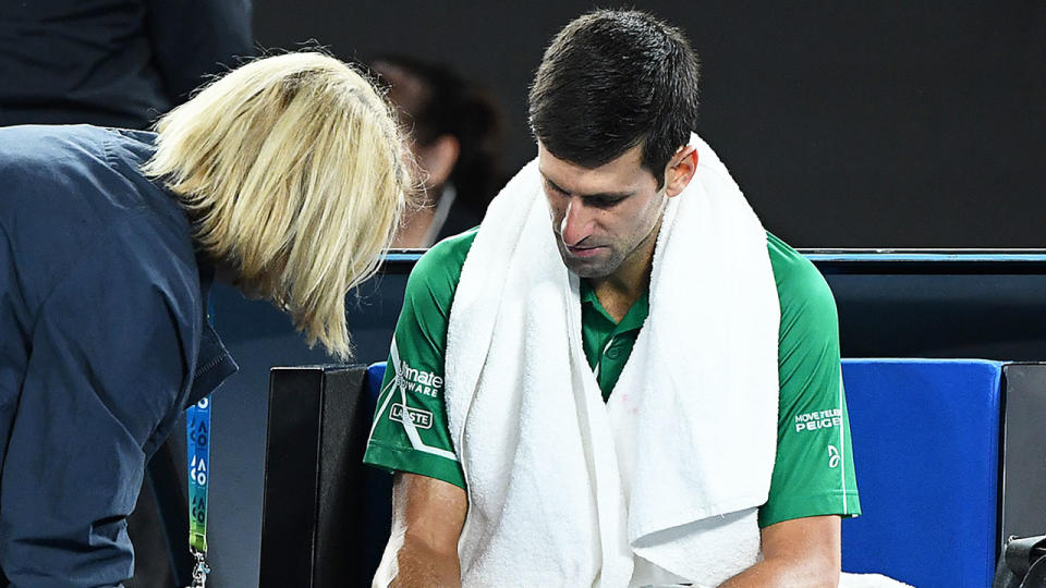 Novak Djokovic called a medical timeout after receiving treatment during the Australian Open final. Pic: Getty