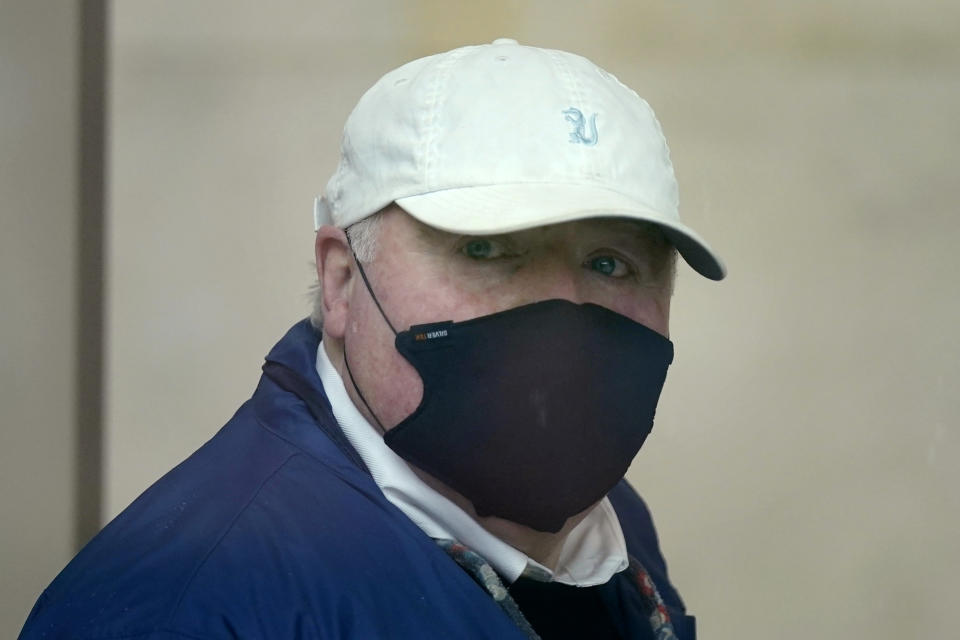 Michael Skakel arrives to a courthouse in Stamford, Conn., Friday, Oct. 30, 2020. Skakel, a Kennedy cousin, is expected at a court hearing as Connecticut prosecutors decide whether to retry him for the bludgeoning death of a fellow teenager in 1975. (AP Photo/Seth Wenig)