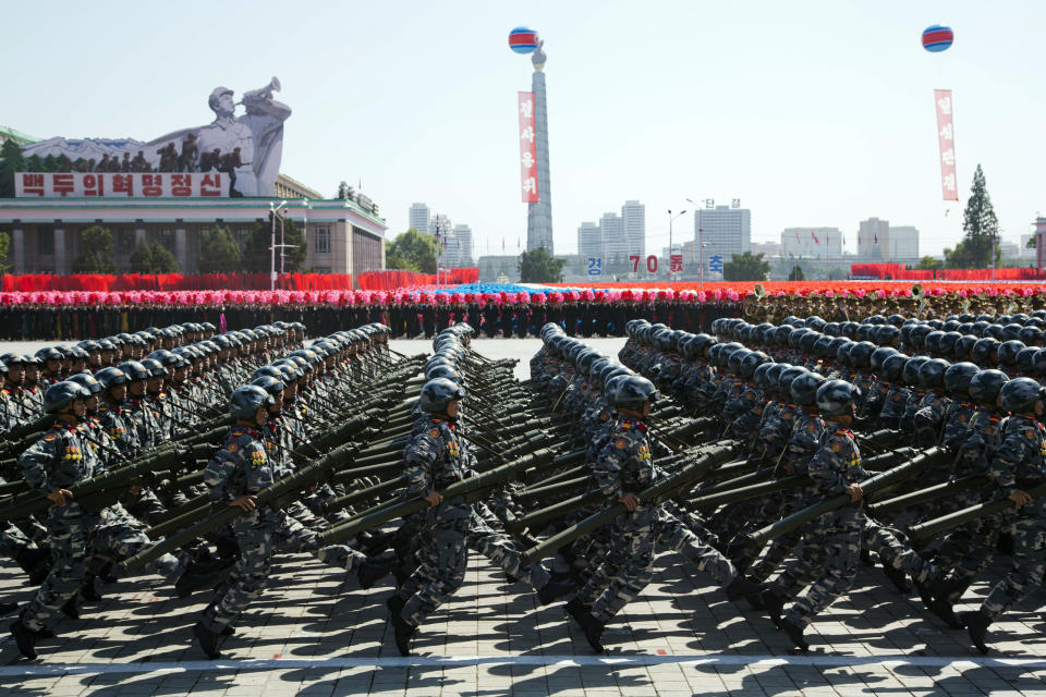 Soldiers march past during a parade for the 70th anniversary of North Korea's founding day in Pyongyang, North Korea, Sunday, Sept. 9, 2018. North Korea staged a major military parade, huge rallies and will revive its iconic mass games on Sunday to mark its 70th anniversary as a nation. (AP Photo/Ng Han Guan)