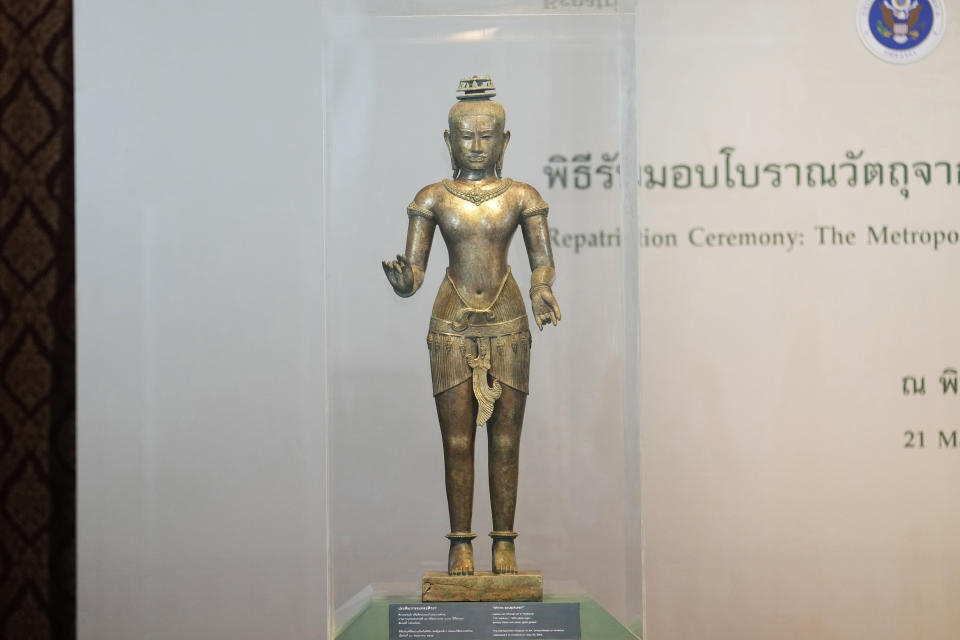 Standing Shiva sculpture from the 11th century is displayed during a repatriation ceremony at National Museum in Bangkok, Thailand, Tuesday, May 21, 2024. Thailand held a ceremony to mark the return of two stolen 1,000-year-old bronze sculptures. The ancient bronze sculptures were returned to Thailand by the Metropolitan Museum of Art in New York. (AP Photo/Sakchai Lalit)