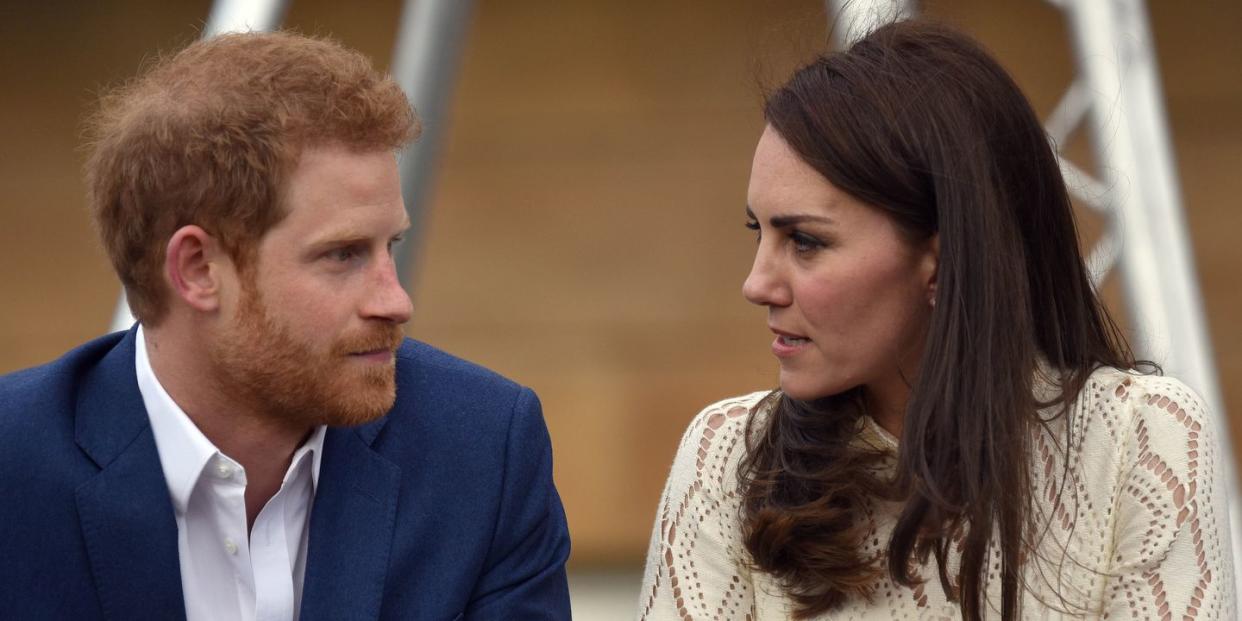 london, united kingdom may 13 catherine, duchess of cambridge and prince harry speak as they host a tea party in the grounds of buckingham palace to honour the children of those who have died serving in the armed forces on may 13, 2017 in london, england photo by andrew parsons wpa poolgetty images