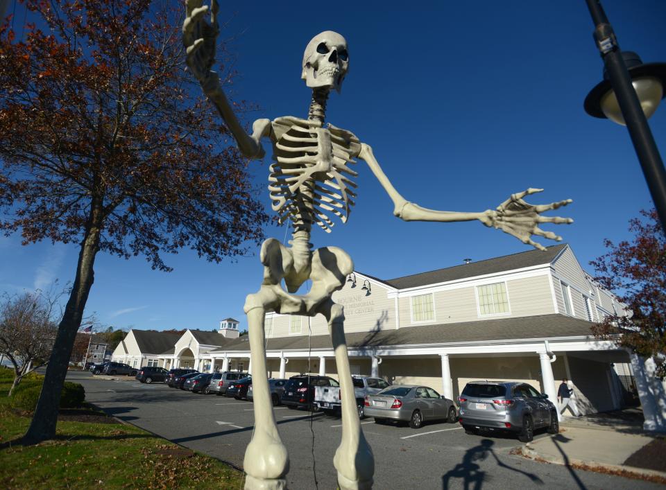 A remnant of Halloween casts a long shadow over the polls, greeting arriving voters on Tuesday at the Bourne Community Center in Buzzards Bay. Precincts 1, 2 and 3 are at the community center.