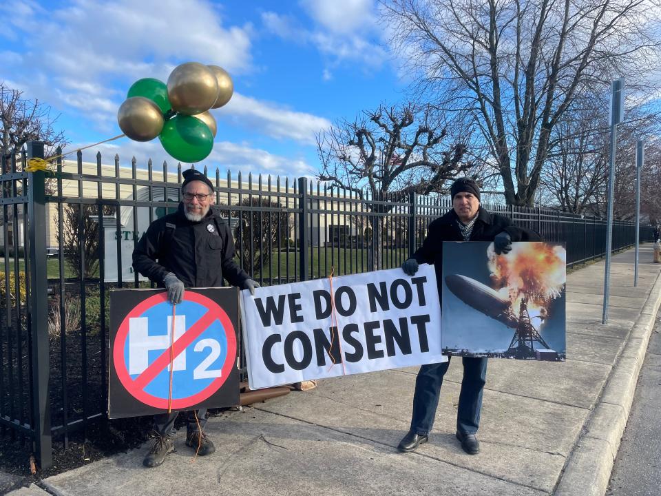 Protesters stand outside of the Philadelphia Steamfitters Union Building during a public meeting for the Mid-Atlantic Hydrogen Hub on March 11, 2024.