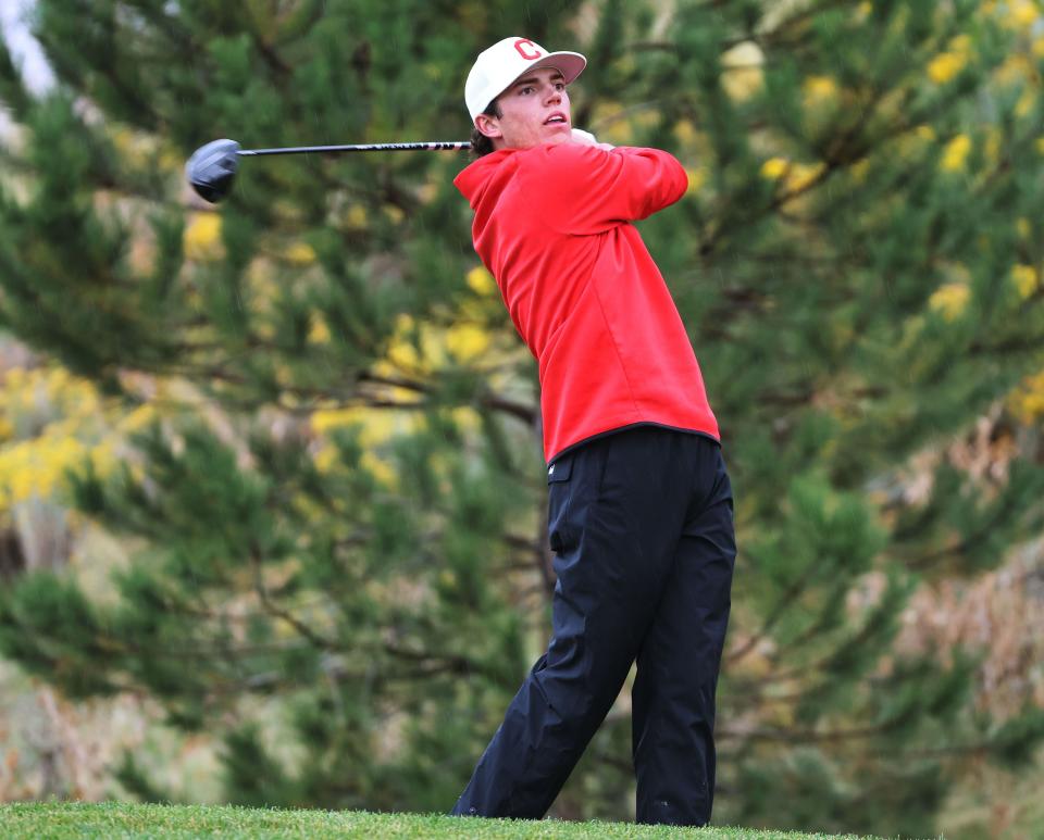 Crimson Cliffs’ Boston Bracken tees off on his way to winning the individual championship in the 4A boys golf tournament at The Ridge Golf Club in West Valley City on Thursday, Oct. 12, 2023. | Jeffrey D. Allred, Deseret News