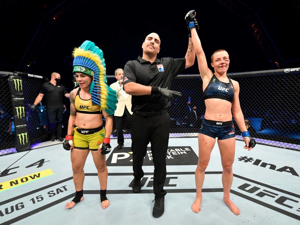 Rose Namajunas, right, is awarded victory over Jessica Andrade: Getty