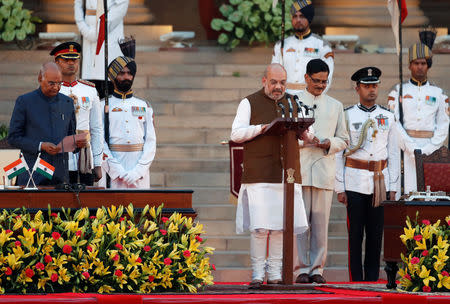 India's President Ram Nath Kovind administers Amit Shah's oath of office during a swearing-in ceremony at the presidential palace in New Delhi, India May 30, 2019. REUTERS/Adnan Abidi