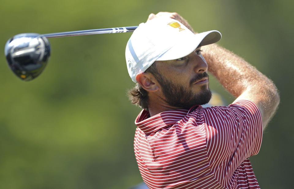 United States Max Homa watches his drive on the 18th hole during practice for the Presidents Cup golf matches at the Quail Hollow Club, Tuesday, Sept. 20, 2022, in Charlotte, N.C. (Jeff Siner/The Charlotte Observer via AP)