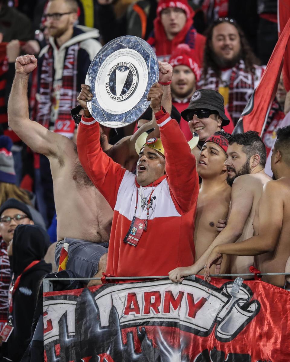 Nov 11, 2018; Harrison, NJ, USA; New York Red Bulls fans hold the Supporters Shield during the second half against the Columbus Crew in the Eastern Conference semifinal at Red Bull Arena. Mandatory Credit: Vincent Carchietta-USA TODAY Sports