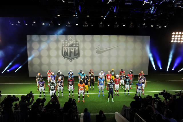 The new New York Giants uniform is displayed on a mannequin in New York,  Tuesday, April 3, 2012. NFL has unveiled its new sleek uniforms designed by  Nike. While most of the