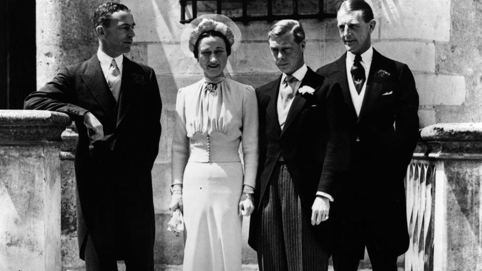 Wallis Simpson and Edward VIII on their wedding day with Herman Rogers and Major Metcalfe by their sides