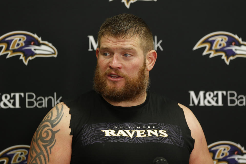 FILE - This is a Dec. 22, 2019, file photo showing Baltimore Ravens offensive guard Marshal Yanda answering questions at a news conference after the Ravens defeated the Cleveland Browns in an NFL football game in Cleveland. Yanda is retiring after 13 seasons in which he was named to the Pro Bowl eight times and helped Baltimore win the 2012 Super Bowl.(AP Photo/Ron Schwane, File)