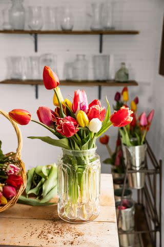 <p>Robbie Caponetto</p> Natural Instinct: Tulips do the work for you when it comes to creating a beautiful bouquet. Place an assortment of the flowers into a wide-mouthed vessel, letting them fall loosely.
