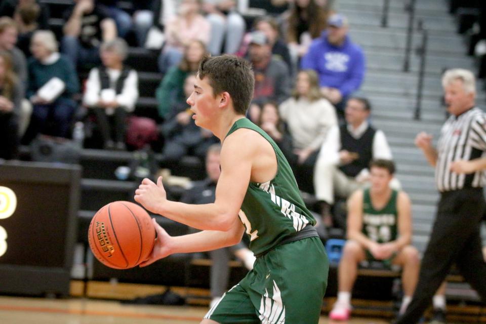 Vinny Sebastian (2) runs to get the ball across halfcourt on Friday, Dec. 8, 2023, in Madrid.