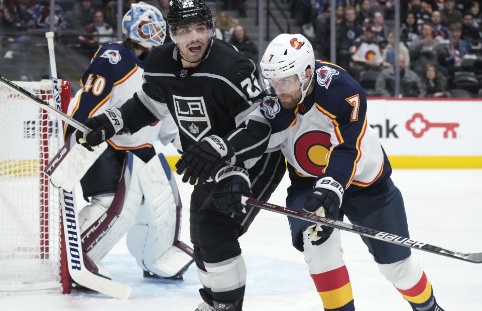 Colorado Avalanche defenseman Devon Toews, right, fights for position against Los Angeles Kings left wing Kevin Fiala in the second period of an NHL hockey game Thursday, Dec. 29, 2022, in Denver. (AP Photo/David Zalubowski)