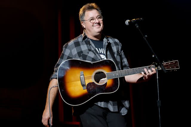 <p>Jason Kempin/Getty</p> Vince Gill performs onstage for Eric Church as Artist-in-Residence at the Country Music Hall of Fame and Museum on Aug. 29, 2023 in Nashville