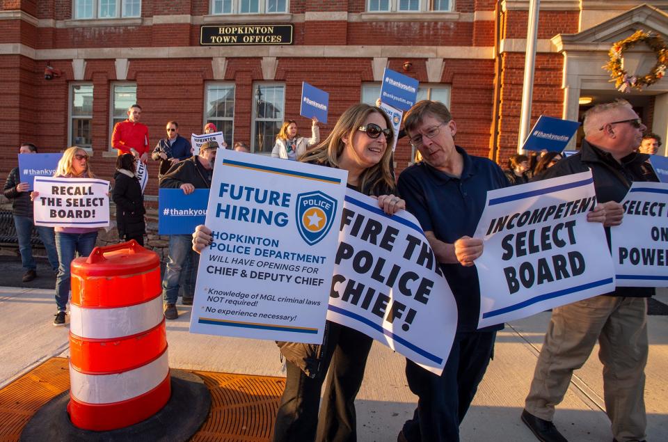 Supporters of police Sgt. Timothy Brennan stand outside Town Hall before an executive session in which the Select Board would vote 4-1 to accept Police Chief Joseph Bennett's recommendation that Brennan be terminated, Feb. 8, 2024.