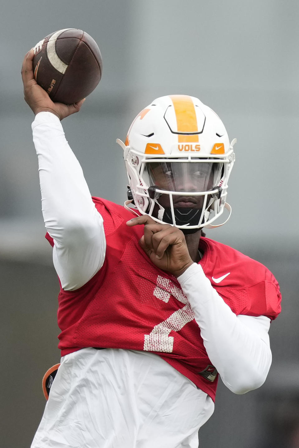 Tennessee Volunteers quarterback Joe Milton III (7) throws a pass during a practice session ahead of the 2022 Orange Bowl, Tuesday, Dec. 27, 2022, in Miami Shores, Fla. Tennessee will face the Clemson Tigers in the Orange Bowl on Friday, Dec. 30.(AP Photo/Rebecca Blackwell)