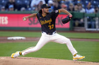 Pittsburgh Pirates starting pitcher Jared Jones delivers during the first inning of a baseball game against the Milwaukee Brewers in Pittsburgh, Monday, April 22, 2024. (AP Photo/Gene J. Puskar)