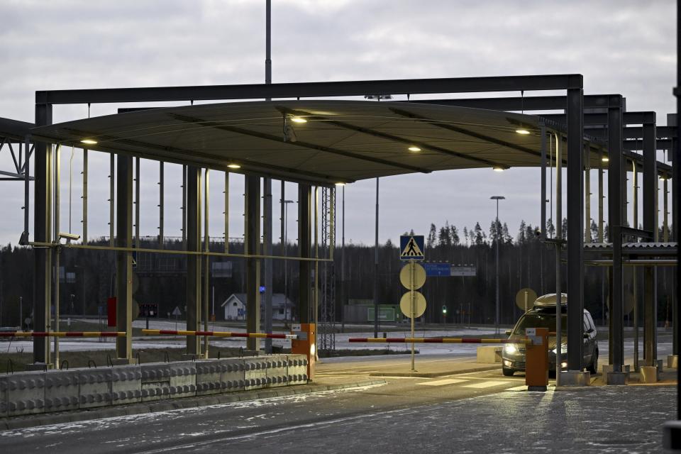 A car approaches the Nuijamaa border station between Russia and Finland in Lappeenranta, Finland, Thursday, Nov. 16, 2023. Finland’s government says it will close four crossing points on its long border with Russia to stop the flow of migrants that it accuses Moscow of ushering to the border in recent months. Finnish officials say they will be closed at midnight Friday on the land border that serves as the European Union’s external border. (Vesa Moilanen/Lehtikuva via AP)