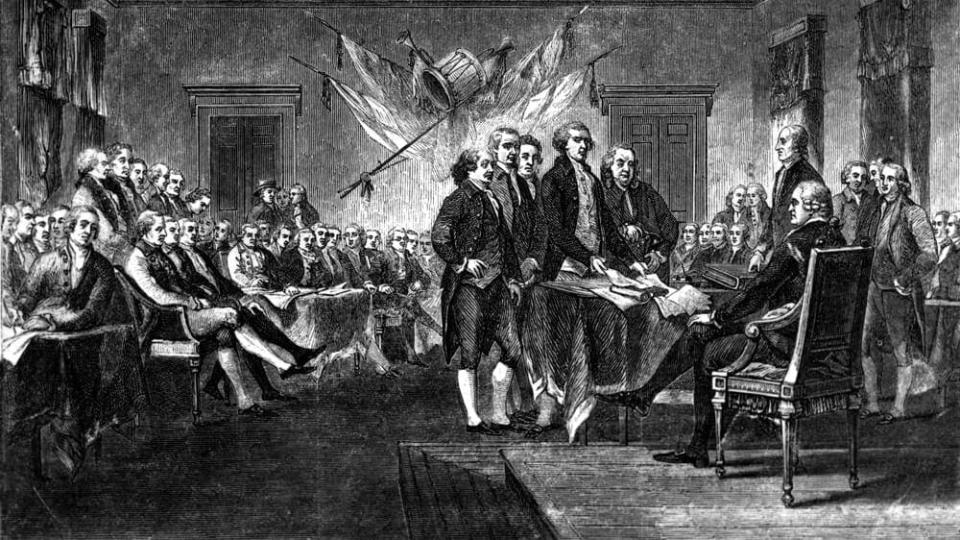 This undated engraving shows the scene on July 4, 1776 when the Declaration of Independence, drafted by Thomas Jefferson, Benjamin Franklin, John Adams, Philip Livingston and Roger Sherman, was approved by the Continental Congress in Philadelphia. The words “all men are created equal” are invoked often but are difficult to define. (AP Photo)
