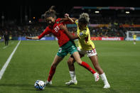 Colombia's Jorelyn Carabali, right, challenges Morocco's Rosella Ayane during the Women's World Cup Group H soccer match between Morocco and Colombia in Perth, Australia, Thursday, Aug. 3, 2023. (AP Photo/Gary Day)