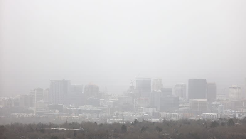 Visibility is limited as dust blows over Salt Lake City during a windstorm on Tuesday, April 18, 2023.