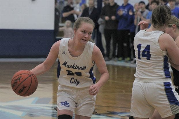 Senior guard Gracie Beauchamp (20) and Mackinaw City can capture a second consecutive girls basketball district title with a win over St. Ignace on Friday.