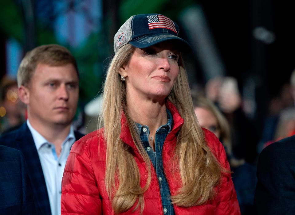 Georgia Republican Senator Kelly Loeffler reacts during a rally with President Donald Trump to support Republican Senate candidates at Valdosta Regional Airport in Valdosta, Georgia on December 5, 2020.