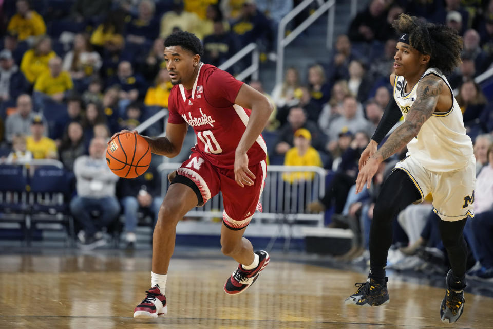 Nebraska guard Jamarques Lawrence (10) drives to the basket during the first half of an NCAA college basketball game Michigan, Wednesday, Feb. 8, 2023, in Ann Arbor, Mich. (AP Photo/Carlos Osorio)