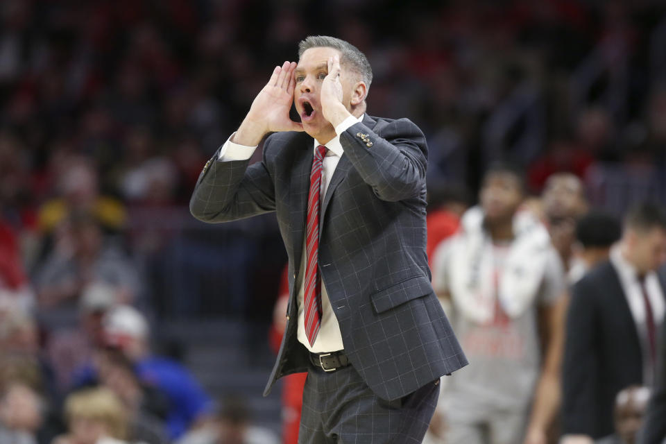 Ohio State head coach Chris Holtmann calls out a play against West Virginia during the first half of an NCAA college basketball game Sunday, Dec. 29, 2019, in Cleveland. West Virginia defeated Ohio State 67-59. (AP Photo/Ron Schwane)(AP Photo/Ron Schwane)