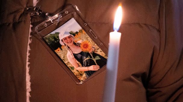 PHOTO: A photo of Abby Zwerner is pinned to a coat during a vigil for Abby Zwerner, the teacher shot by a 6-year-old student at Richneck Elementary, in front of the Newport News Public Schools Administration Building in January. (Billy Schuerman/The Virginian-Pilot/Tribune News Service via Getty Images)