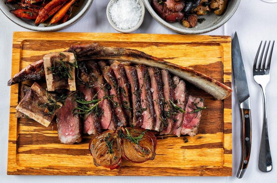 Avalon's heftiest steak: a 36-ounce, 30-day aged prime "tomahawk" bone-in rib-eye.