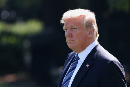 U.S. President Donald Trump walks to Marine One while departing the White House in Washington, U.S., September 6, 2018. REUTERS/Chris Wattie