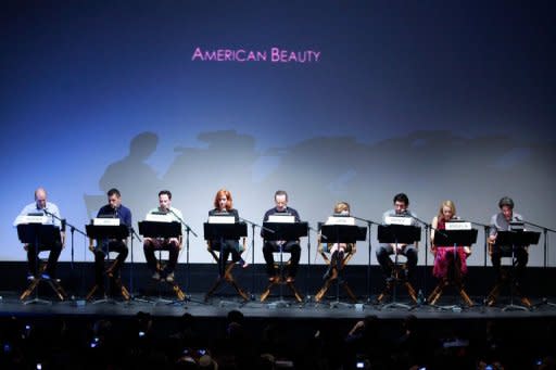 (L-R) Paul Scheer, George Stroumboulopoulos, Nick Kroll, Christina Hendricks, Bryan Cranston, Mae Whitman, Adam Driver, Sarah Gadon and Jason Reitman on stage at the Jason Reitman all-star cast live table read of Alan Ball's screenplay for "American Beauty" during the 2012 Toronto International Film Festival on September 6, 2012 in Toronto, Canada