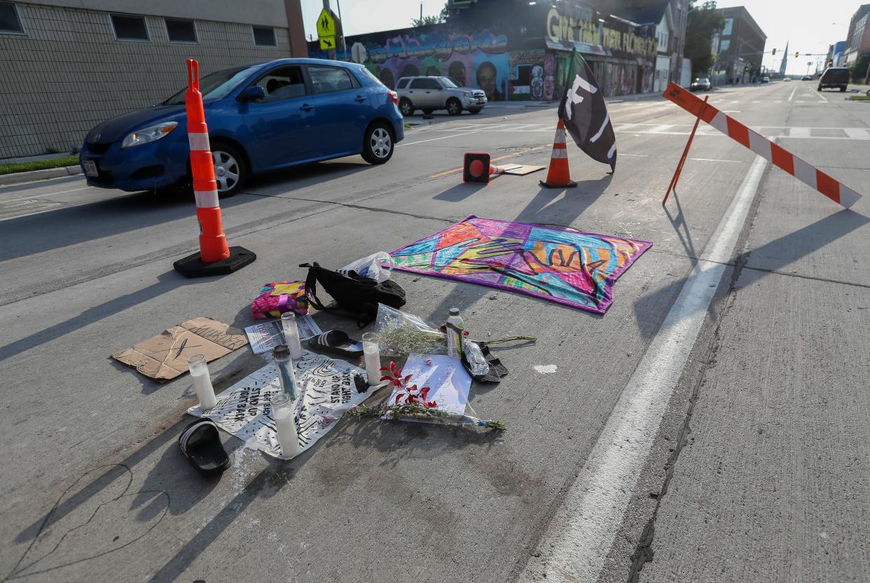 A memorial shrine for Samuel Sharpe Jr. was created near where officers fatally shot him on Wednesday, July 17, 2024, at North 14th Street and West Vliet Street in Milwaukee, Wis. Members of the Columbus, Ohio, police department, who were in Milwaukee to provide security for the Republican National Convention, shot and killed Sharpe, as body camera footage showed him lunging with knives at another man after being instructed to drop the weapons by officers. Tork Mason/USA TODAY NETWORK-Wisconsin