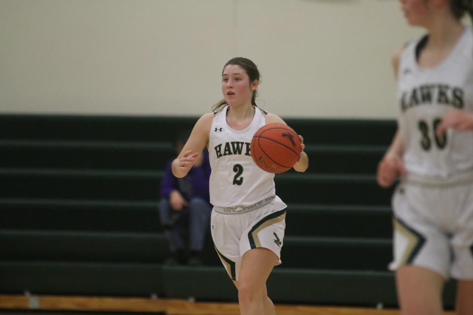 Lexi Bogardus brings the ball down the floor during the postseason opener against West Central Valley on Saturday, Feb. 11, 2023, in Woodward.