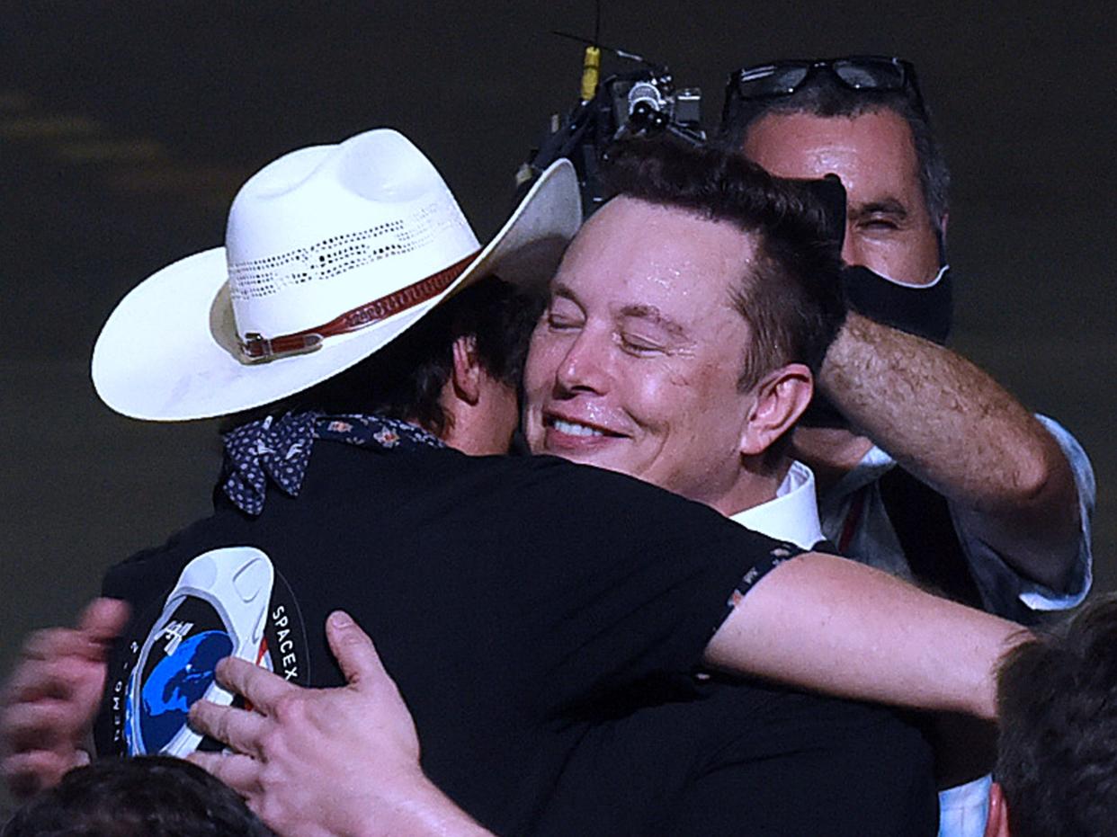 Elon Musk hugs Kimbal Musk SpaceX Launch