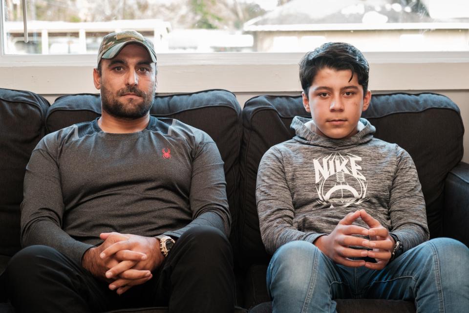 Jan. 16, 2022 - Mohammad Watandost, left,  and his son Rahmatullah sit for a portrait in their Memphis home.