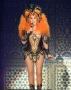 <p>Opening her 2019 Here We Go Again tour in a gladiator-inspired bodysuit and giant orange wig. </p>