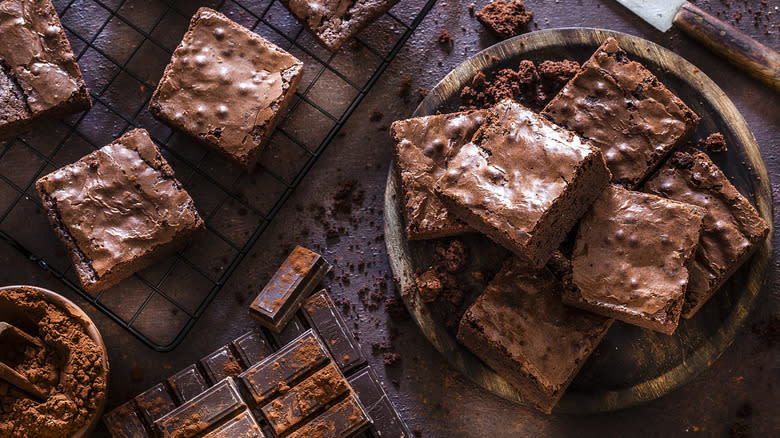 Homemada chocolate brownies shot on a dark table